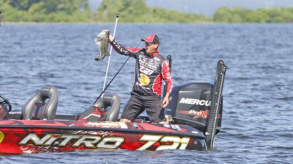 After boating a solid 7- to 8-pounder, KVD managed to bury the treble hook of a deep diving crankbait near the palm of his hand.