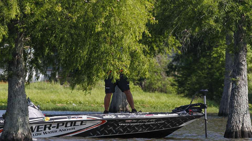 Just moments after releasing that fish, Lane hooks up behind some trees.
