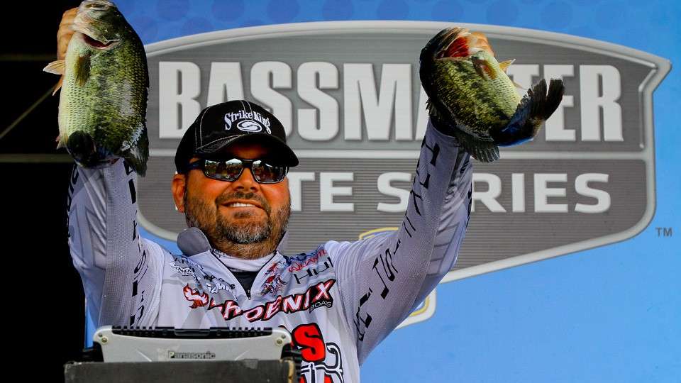 Greg Hackney weighs in, later it was determined he was fishing in an off-limits area and his Day 1 catch was disqualified. This eliminated his 40 point lead in the Toyota Angler of the Year standings. 