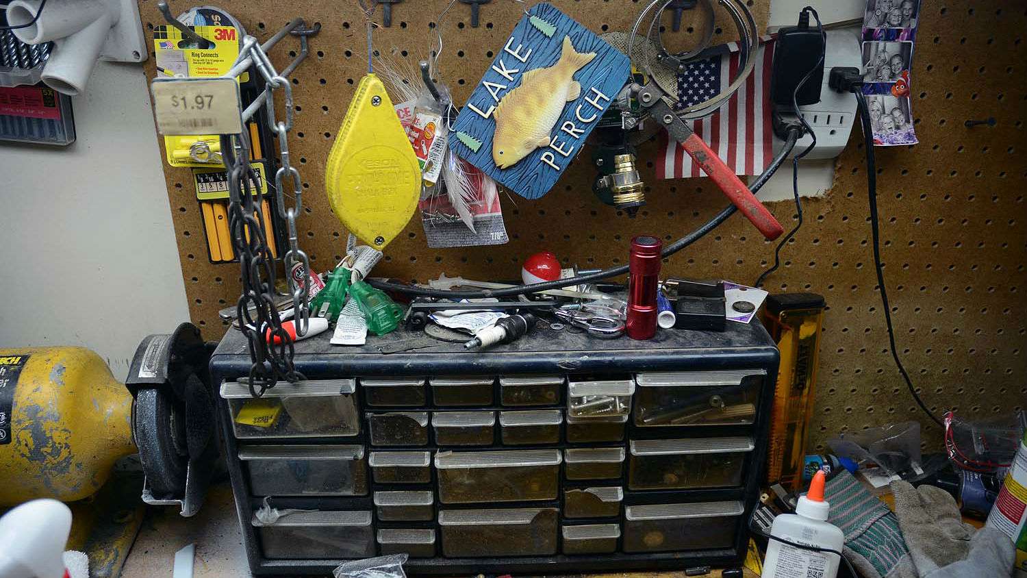 The only evidence this bench belongs to a fisherman is the assortment of random bobbers. Those are byproducts of outings on Lake Guntersville with his children.