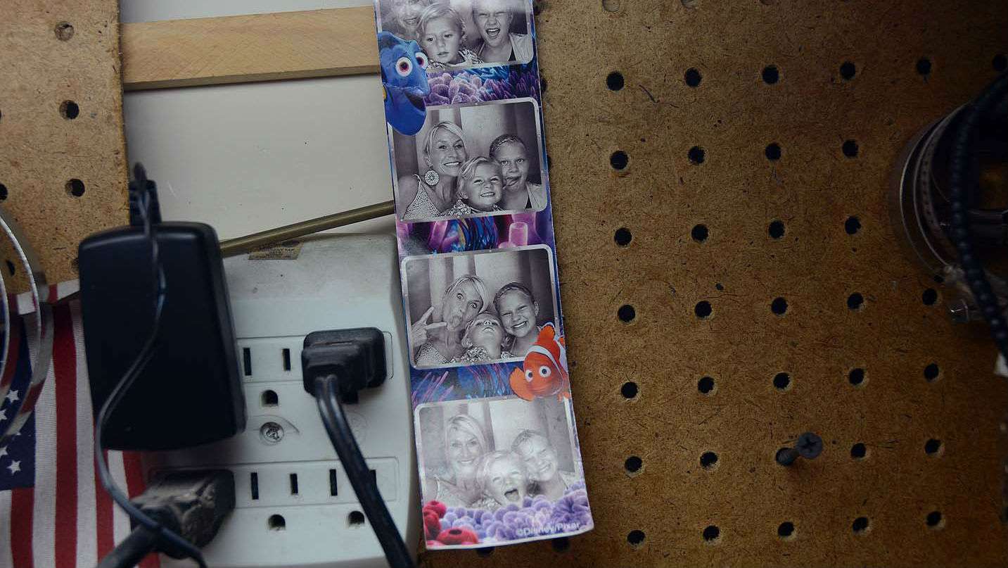 Here are some of those children posing in a photo booth picture with Holly. Hannah, Hunter, Cal and Coleman make up the Lane clan. 
