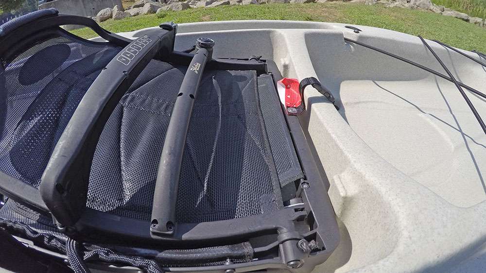 The back of the seat is secured to the kayak by a easy-to-release clip. 