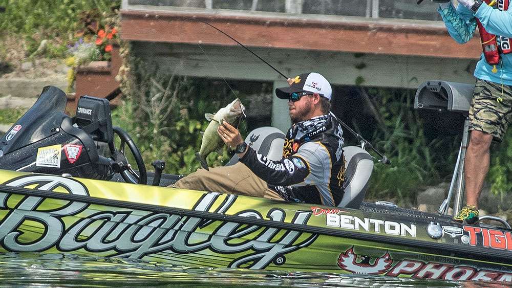 The hefty bass comes overboard and gets a face-to-face look with Benton.