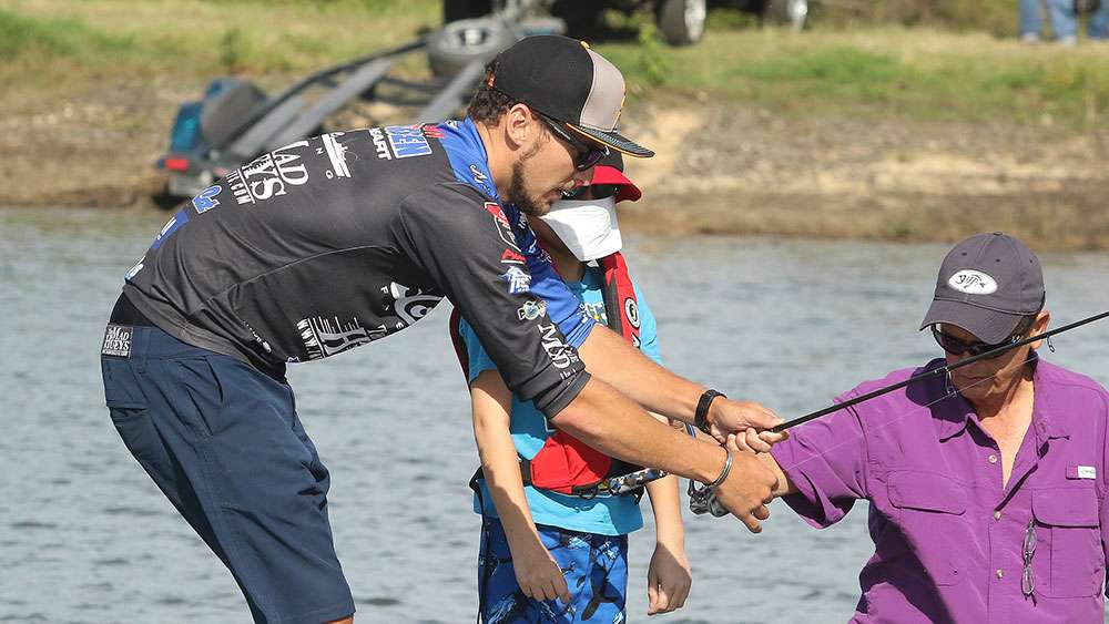 On the water, Jocumsen gave Michael a few rudimentary instructions on how to utilize the spinning tackle.