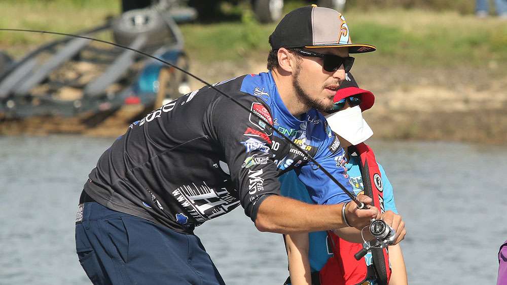 Jocumsen showed him how to release the bail on the spinning reel and make a cast.