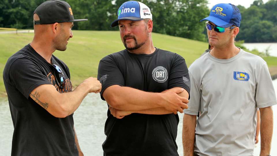 Frenchman David, Jean-Christophe (left) has a word with Elite Series angler Fred âBoom Boomâ Roumbanis and Matt Loetscher.