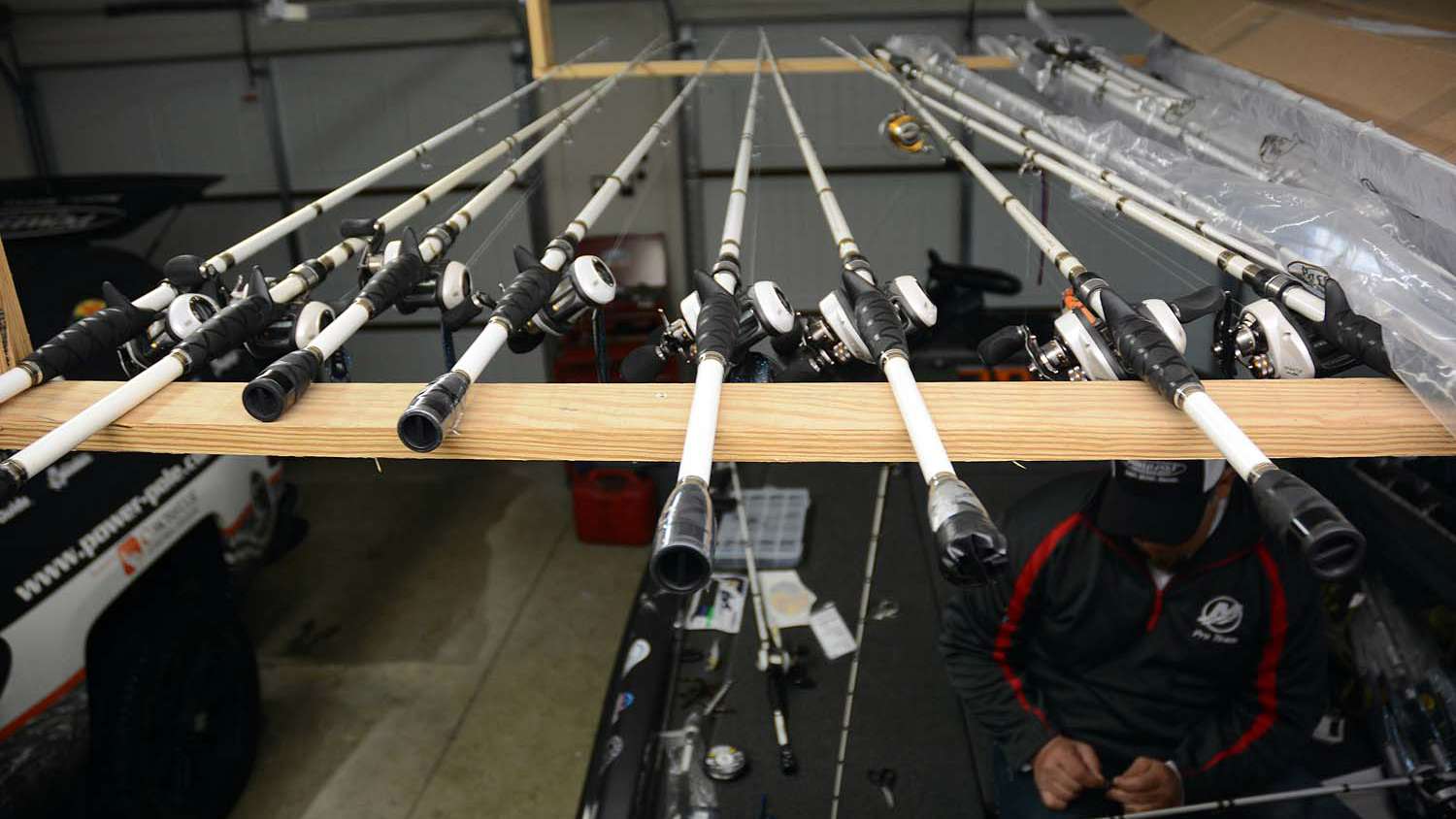 Above the boat is this homemade rod rack. Itâs a simple and functional design for temporarily storing rod-and-reel combos. Lane can easily see and then reach for what he needs to load in the boat. 