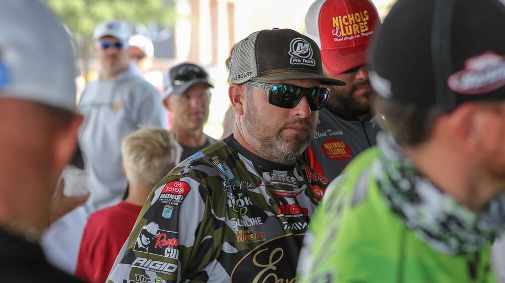 Backstage the anglers wait their turn. Brett Hite is behind Adrian Avena, who has his own personal shade of green. 