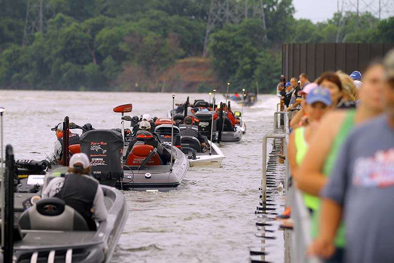 The final boats pass through the check out line and out into the river. 