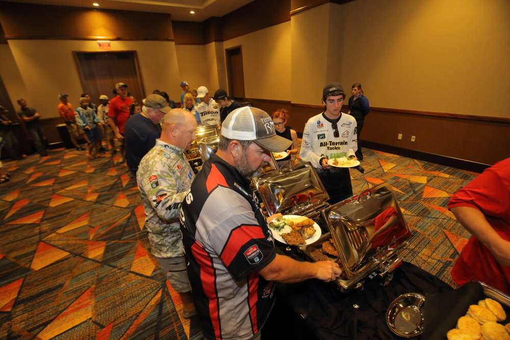 The Bassmaster High School All-Americans and Elite Series pros fill their plates at the special buffet dinner.