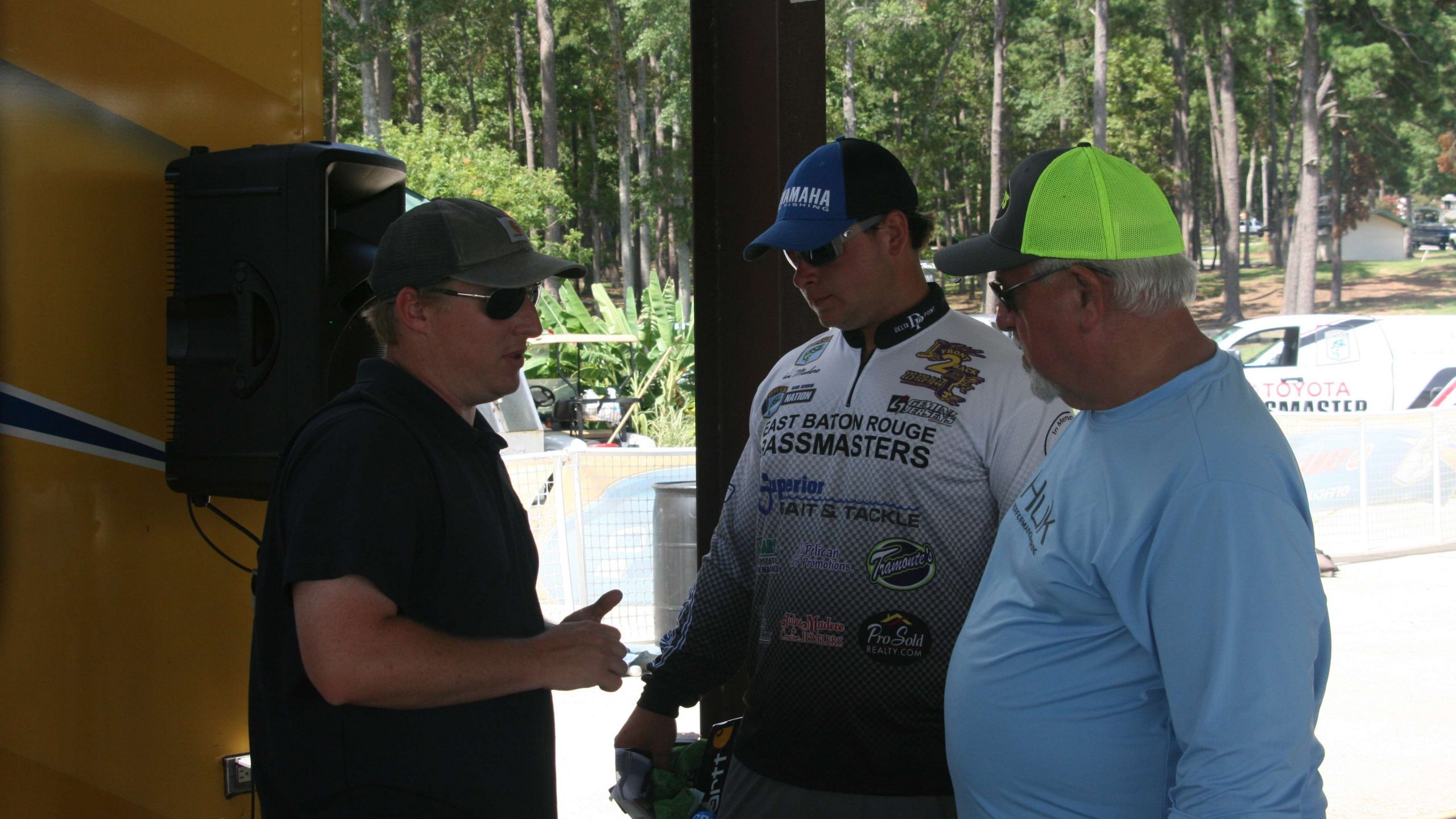 Tournament Director Hank Weldon of B.A.S.S speaks to Ian Madere of Baton Rouge an Jim Welverton during registration.