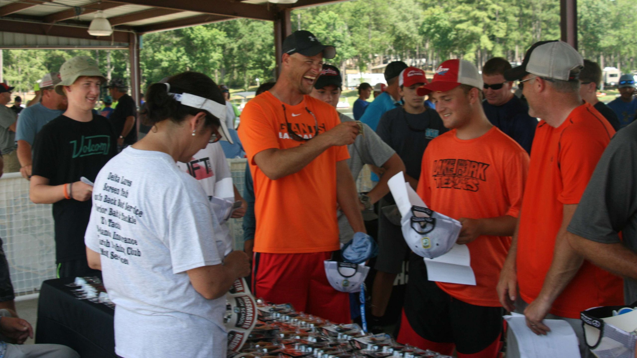 High school anglers are tickled by the chance to grab a lure from this table.