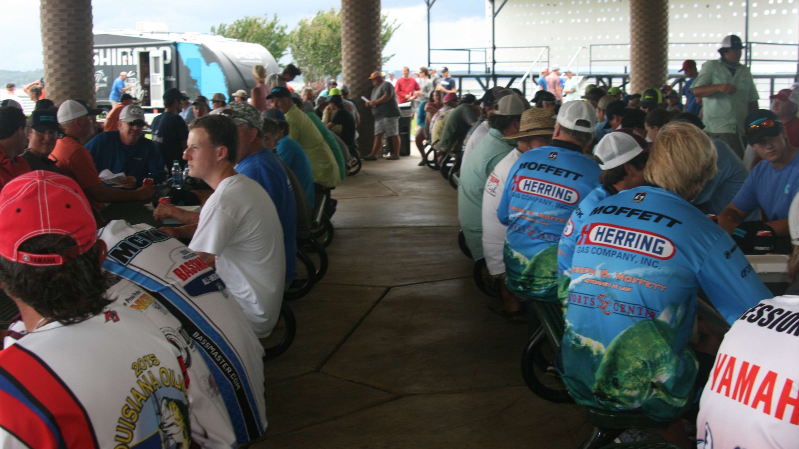 The pavilion filled up with hungry folks who saw rain clouds moving in quickly over Toledo Bend.