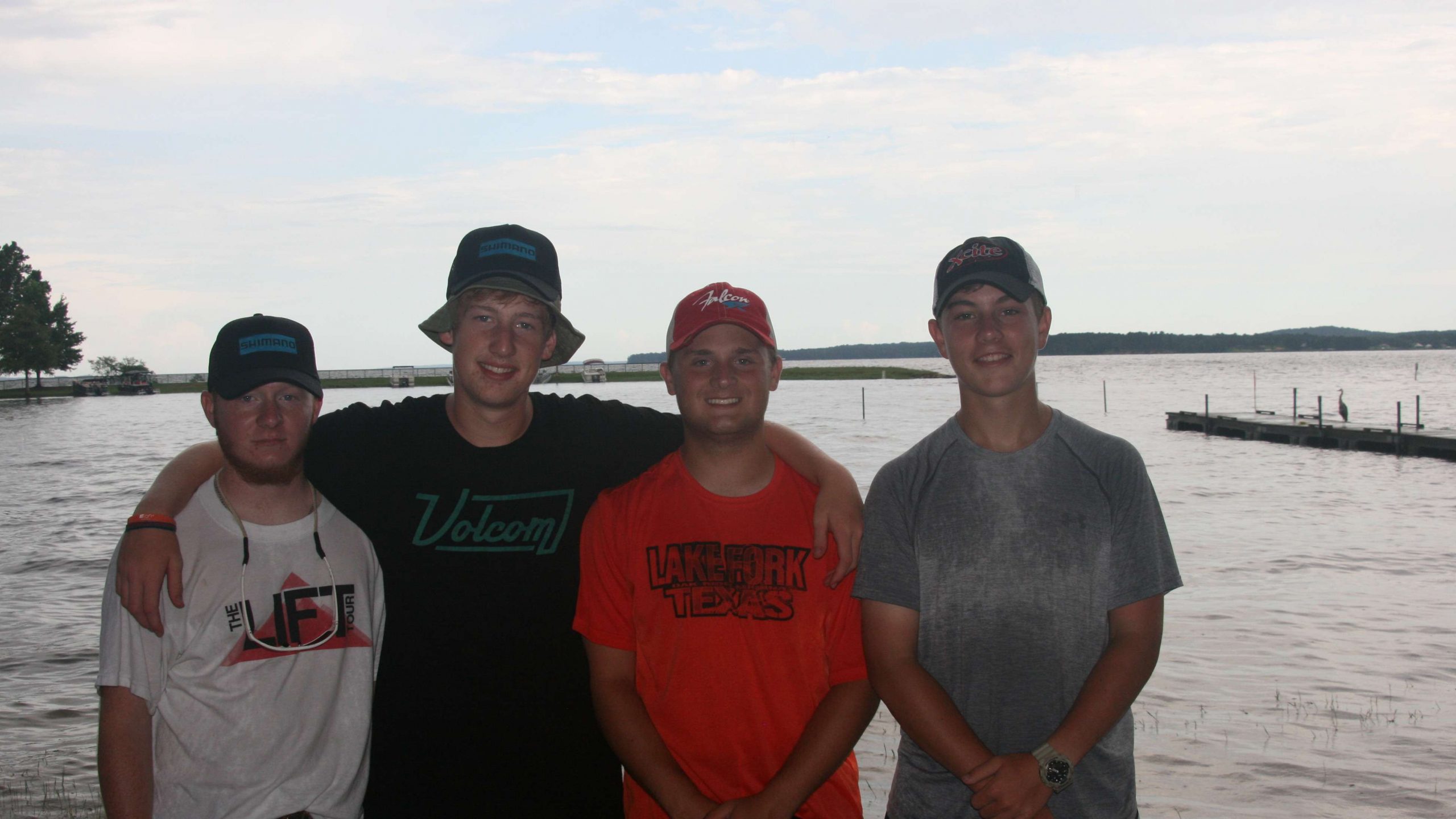 D.J. Condor, Max Thomas, Eric Noyes, and Mason Mitchell of Broken Arrow, Oklahoma were all wet after the rain, but are hoping for good things during Monday's fishing on Toledo Bend.