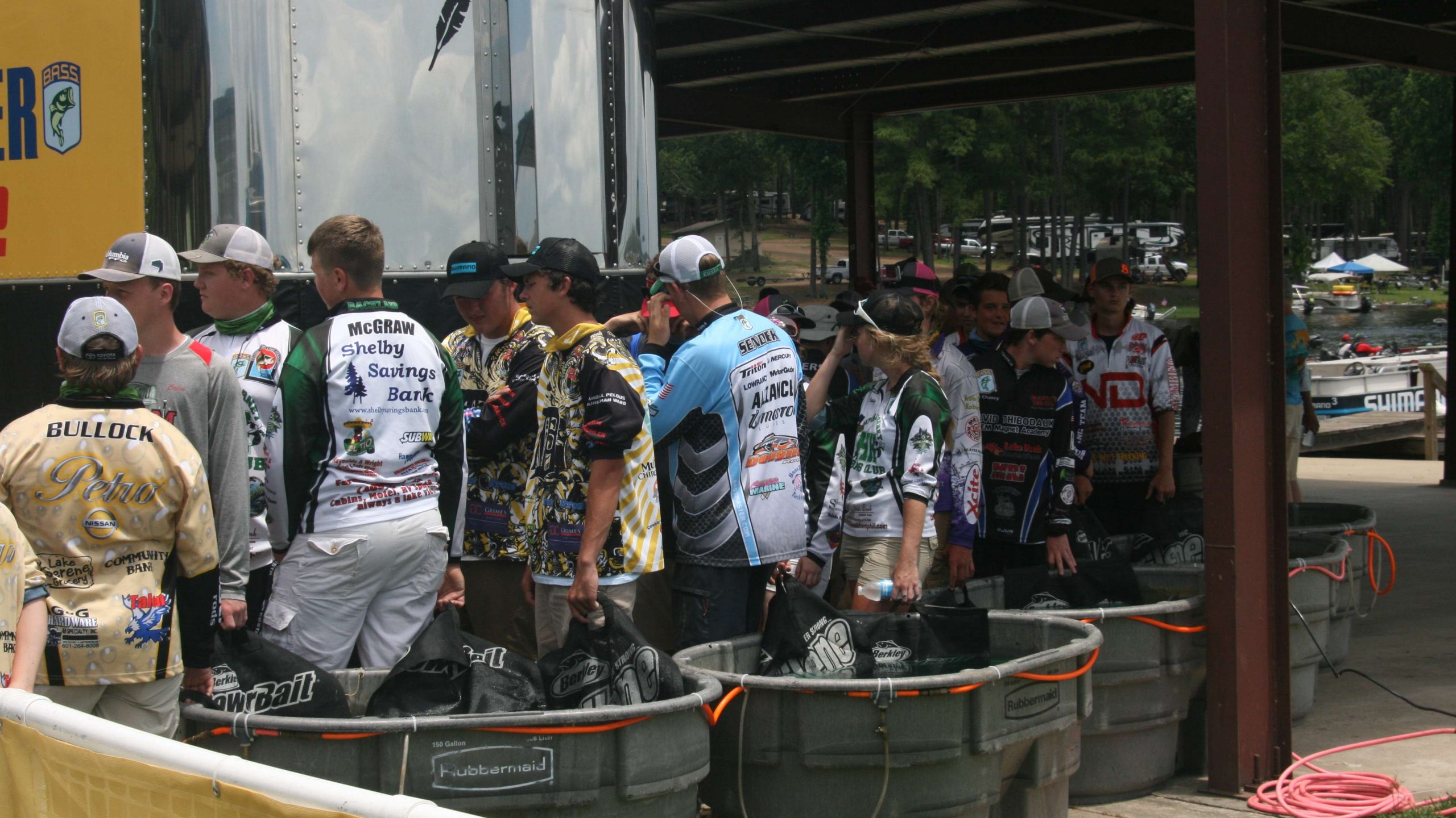 The high school anglers begin to make a long line backstage as the weigh-in is set to start.
