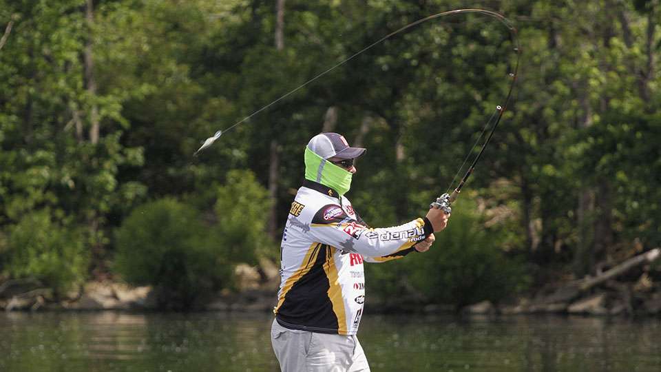 Brandon Herzberg of Adrian College slings out a crankbait.