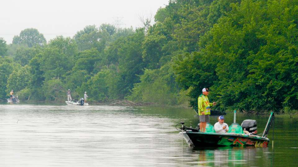 With the main river channel high and muddy, anglers were crowded into areas with clearer water.