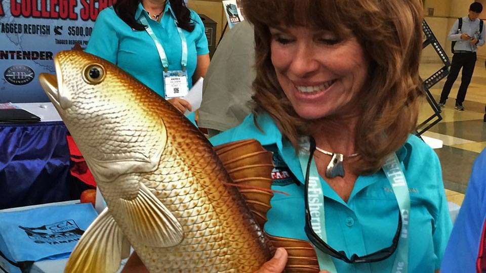 A girl and her fish -- sounds like some weird movie. Leiza Fitzgerald carried this replica redfish all around the convention center to draw attention to the Coastal Conservation Association and its efforts to maintain coastal resources for generations to come. 