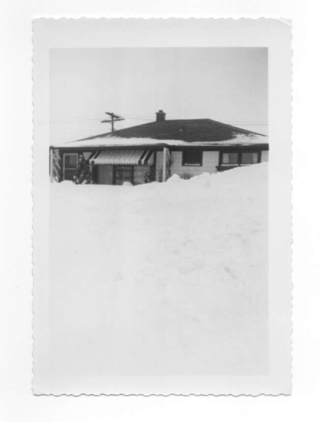 This is the house I was brought home from the hospital to, it's a few blocks over the Buffalo city line. The photo is circa 1952, as am I, and all that white stuff is pretty much the result of the Lake Effect snow off the New York Blue waters that surround Buffalo and Western New York.