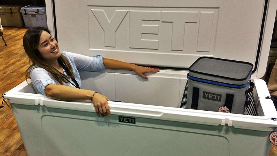After a day of walking the aisles forever, or so it seemed, an ice bath in this Yeti 350 cooler (retail like $1,299) would have cooled off screaming leg muscles. Des Hunter of Yeti takes the plunge to show how a person, maybe two, could easily fit into its 82.4-gallon capacity. The smaller Hopper Flip 12 ($279.99) to the right won as top Fishing Accessory.