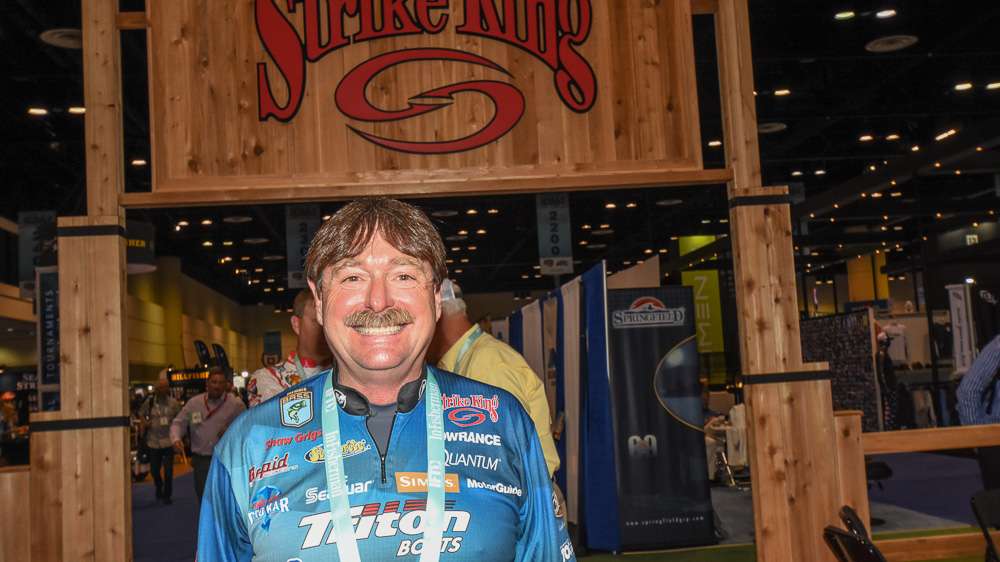 Shaw Grigsby has a grin for visitors to the large Strike King booth.