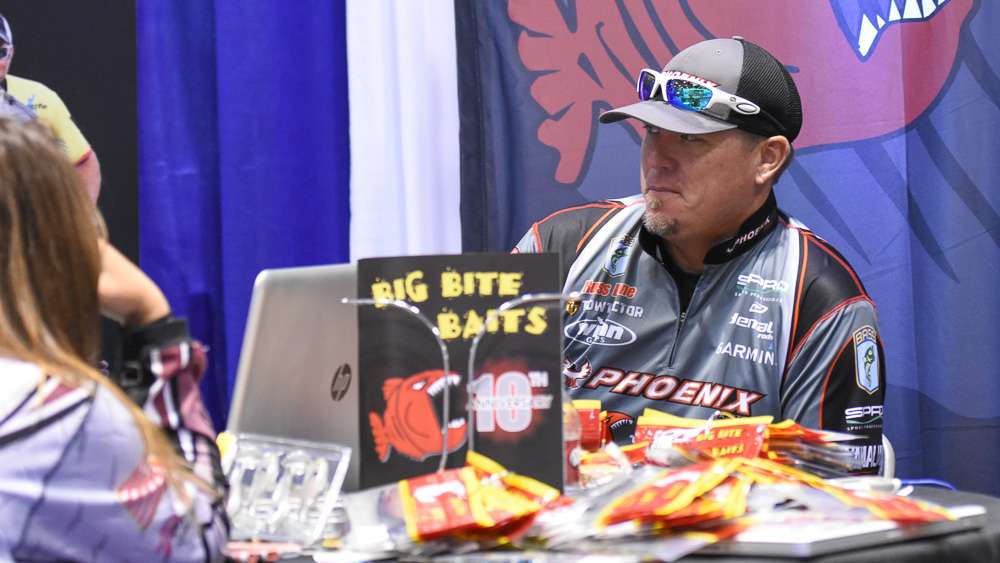 Russ Lane catches a rest in the Big Bite Baits booth.