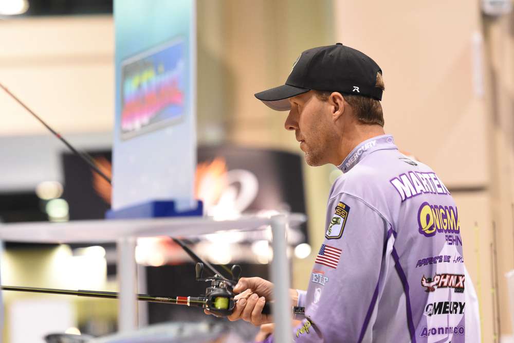 Aaron Martens ends day three of ICAST with a flip-off challenge in the American Tackle Company booth.