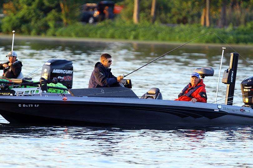 Some anglers in the latter flights take advantage of the down time to make final adjustments to tackle. 