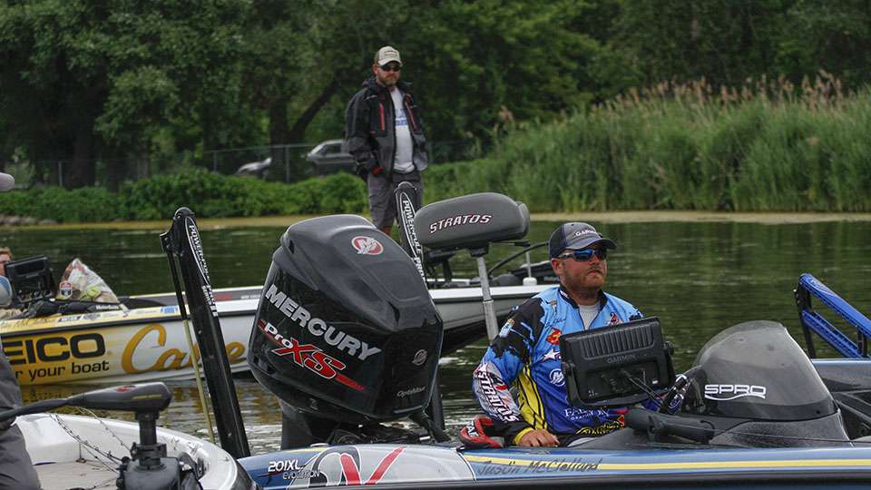 Father McClelland (Elite Series Pro Mike McClelland), waits for his son Justin to back out of a spot at the dock.