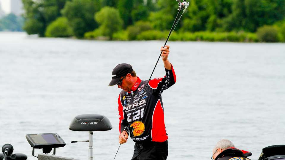 VanDam pulled his rods from the locker in his boat...