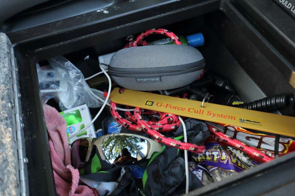 A miscellaneous box holds a big mixture of items, including a G-Force Cull System from T-H Marine.
