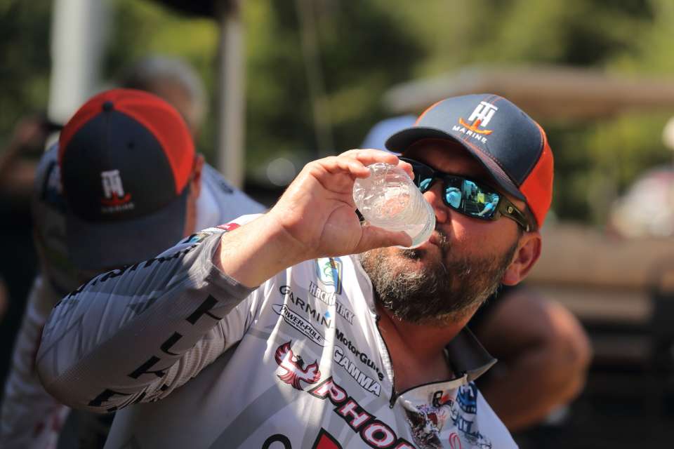 Greg Hackney drinks cold water after a hot day out on Potomac.