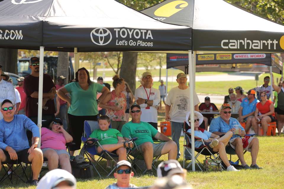 Fans enjoy the weigh-in under Toyota and Carhartt tents where they can stay out of the heat.