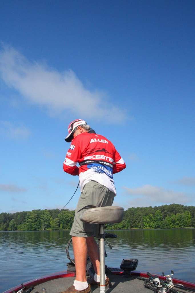 <b>7:54 a.m.</b> Allen tries a surface frog around some laydown trees.
<p>
<b>8:31 a.m.</b> Allen sticks a bass that bit his finesse worm near a submerged brushpile.
