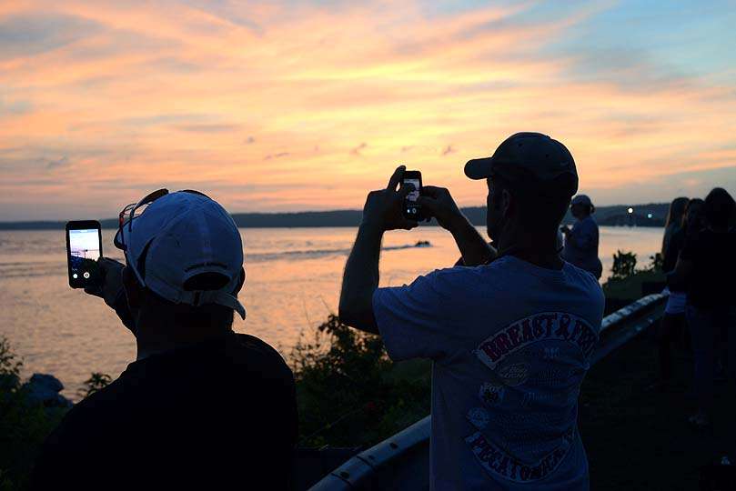 Taking photos and making memories is a popular activity on the shoreline.