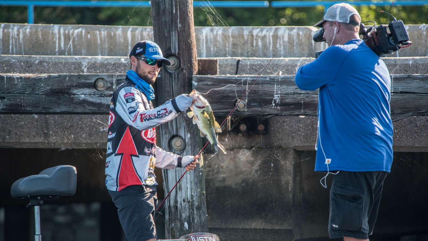 Lucas raises the fish up to show the folks watching Bassmaster LIVE. 