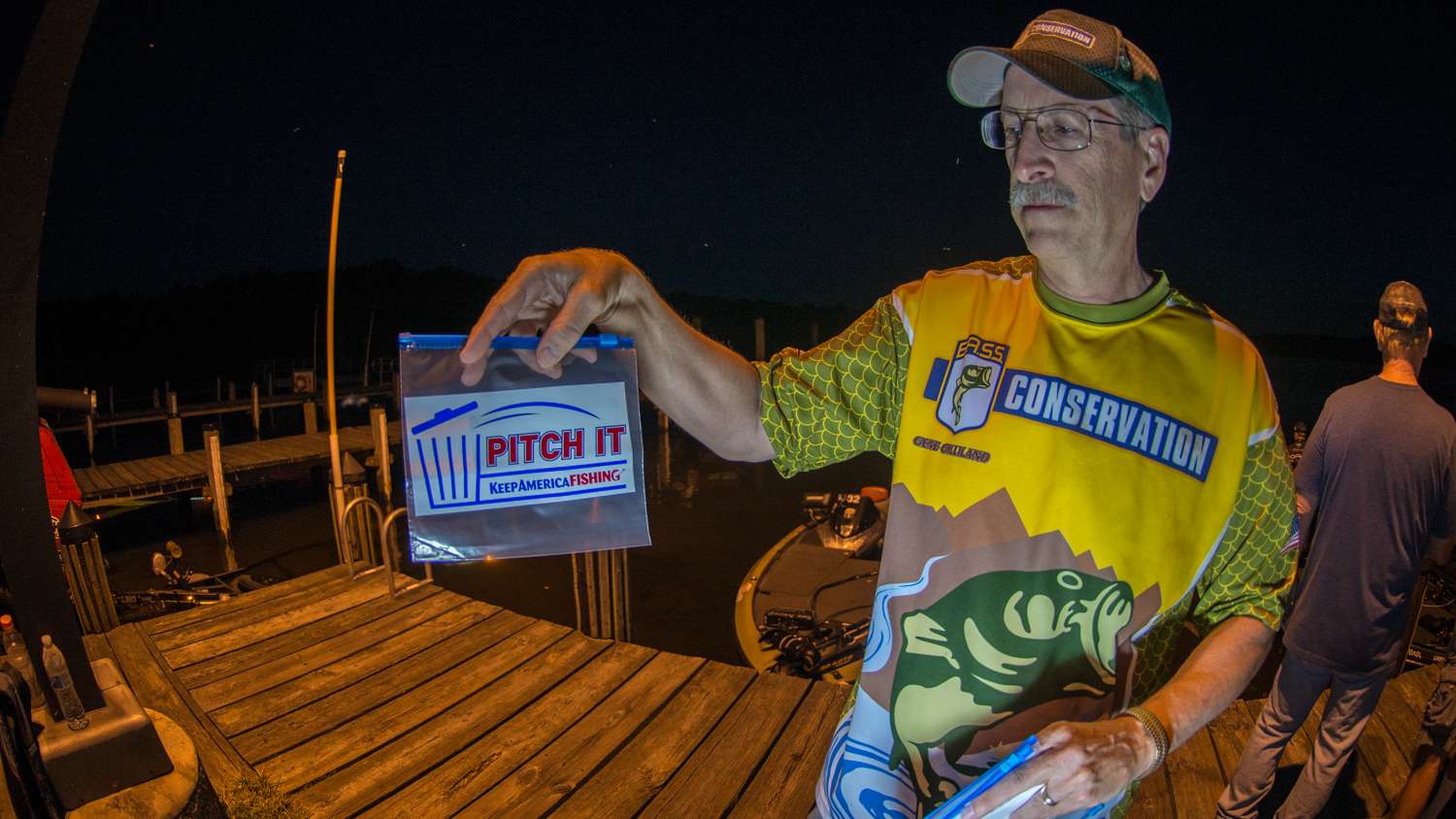 Bassmaster Conservation Direction Gene Gilliland shows a bag the competitors are encouraged to put their used soft plastics in. 