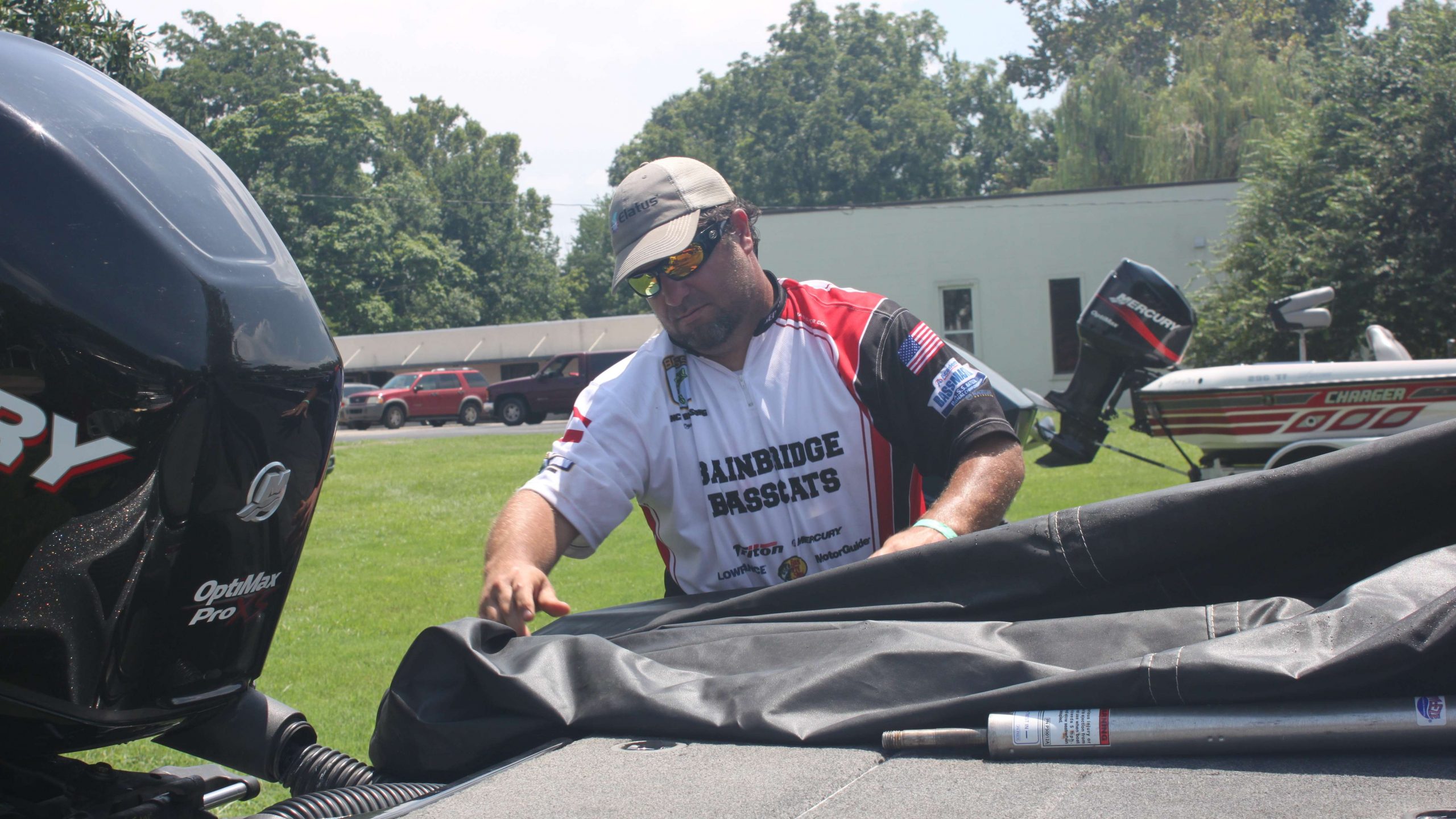 Lance Birdsong said his wife would love to see a picture of him working on his boat on Bassmaster.com. Here you go, as heâs putting the cover on the rig. Good job, Lance!

