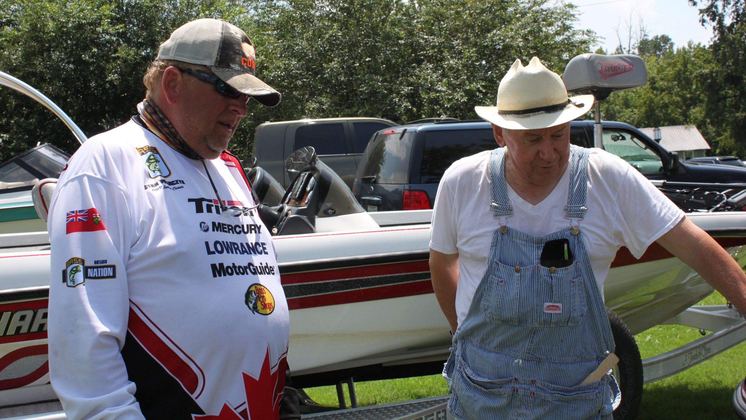 Tam Canada coach Stan Pilarczyk chats with a Huntingdon area fishing fan.

