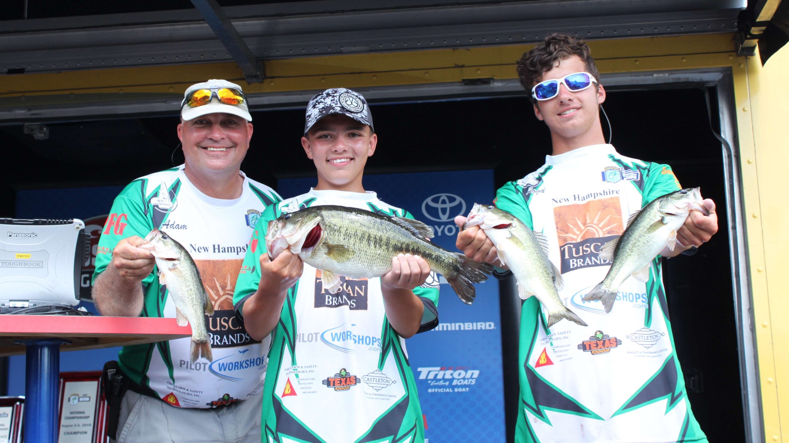New Hampshire coach Adam Daniels, and anglers Jack Armstrong and Logan Daniels show the haul that helped the team to a second-place finish. Their catch of 7-14 on Day 2 gave them a two-day total of 15-13.
