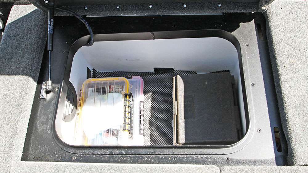 Behind the driver's seat is a storage compartment where he keeps added tackle and tools. 