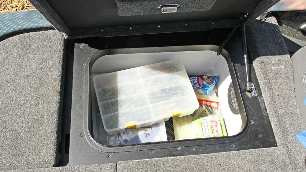 Here's a look into the storage compartment behind the passenger seat. 