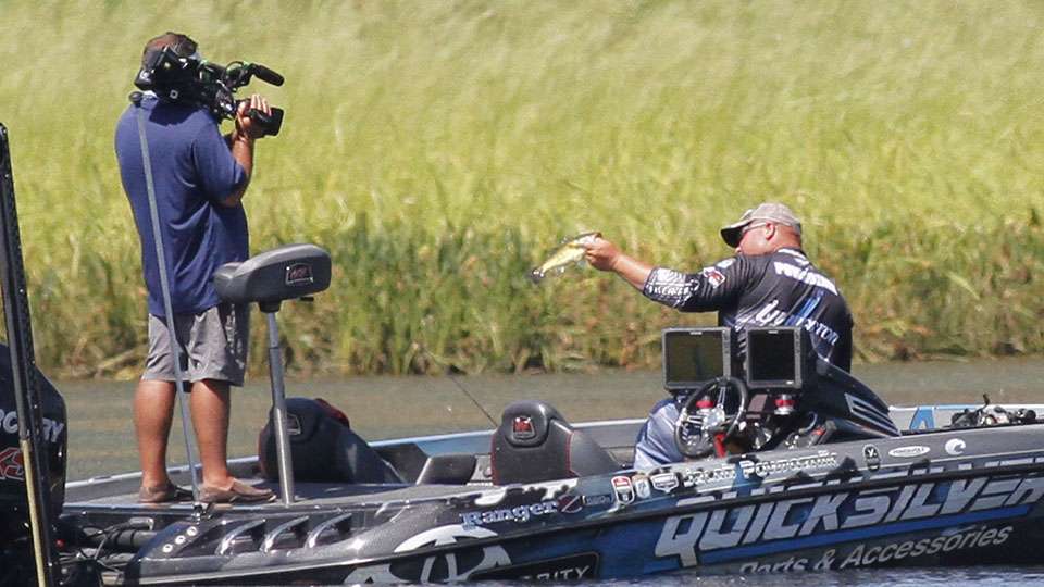 After measuring it he shows it off for the Bassmaster LIVE viewers and officially has his first keeper of the day.