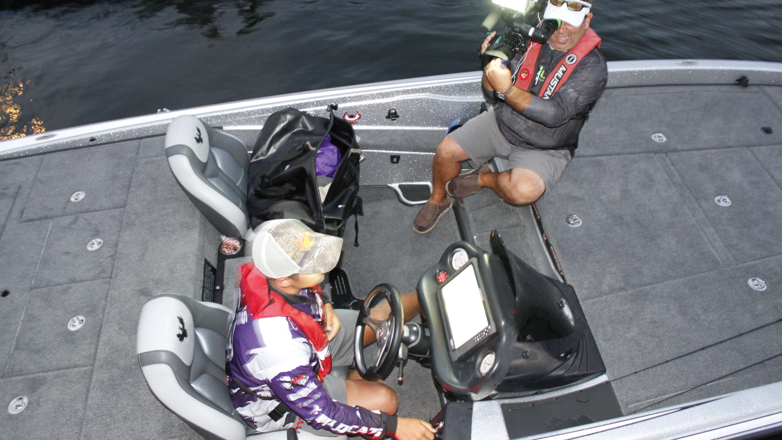 The top college anglers come cameras on their boats Thursday.