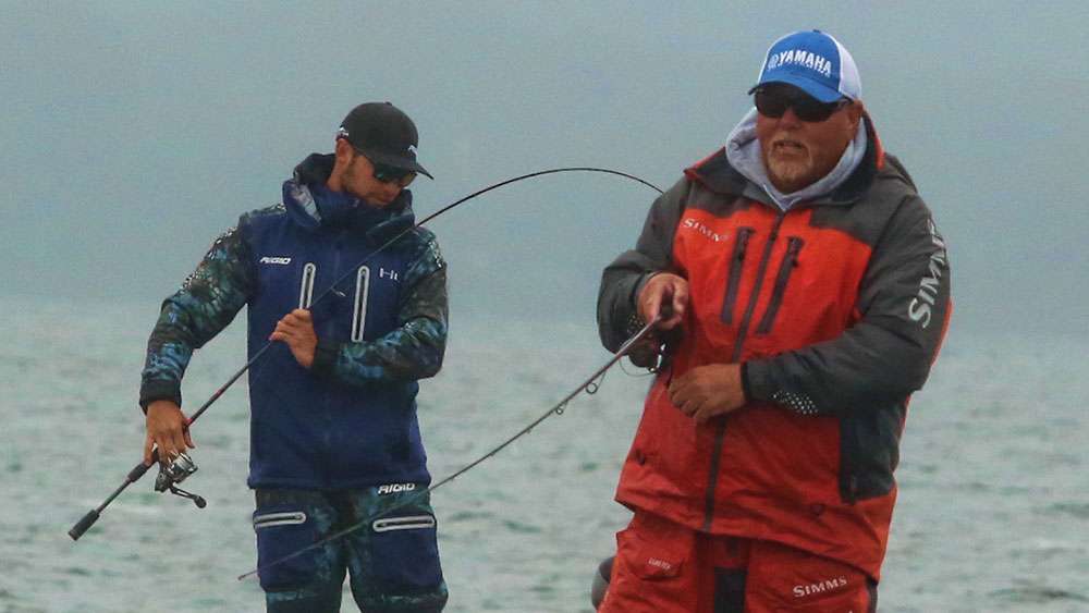 This is a unique scene on the Elite Series, two anglers so close together fighting fish at the same time.