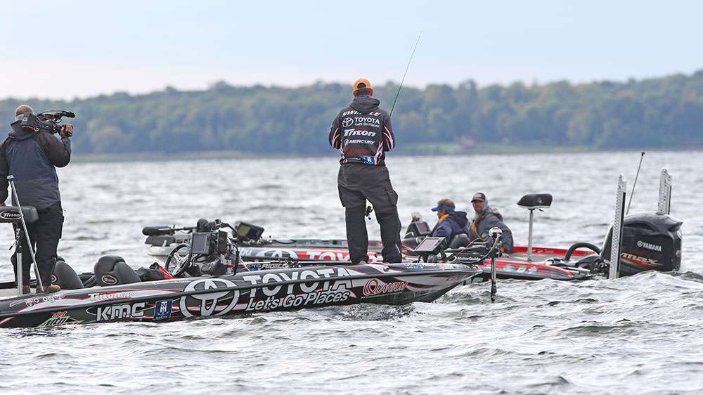 As Mike Iaconelli drives by. The two anglers briefly talk before Ike moves off.