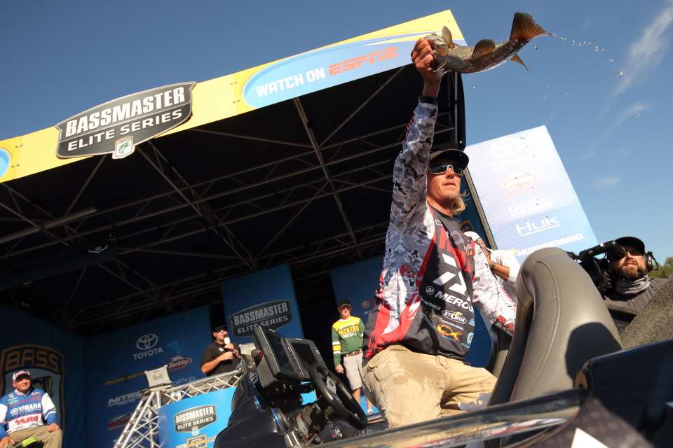 Seth Feider shows the fans some beautiful Mississippi River bass.