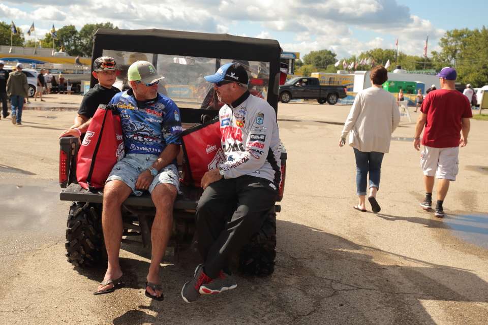 Anglers take advantage of the ride from their boat to the weigh-in stage.