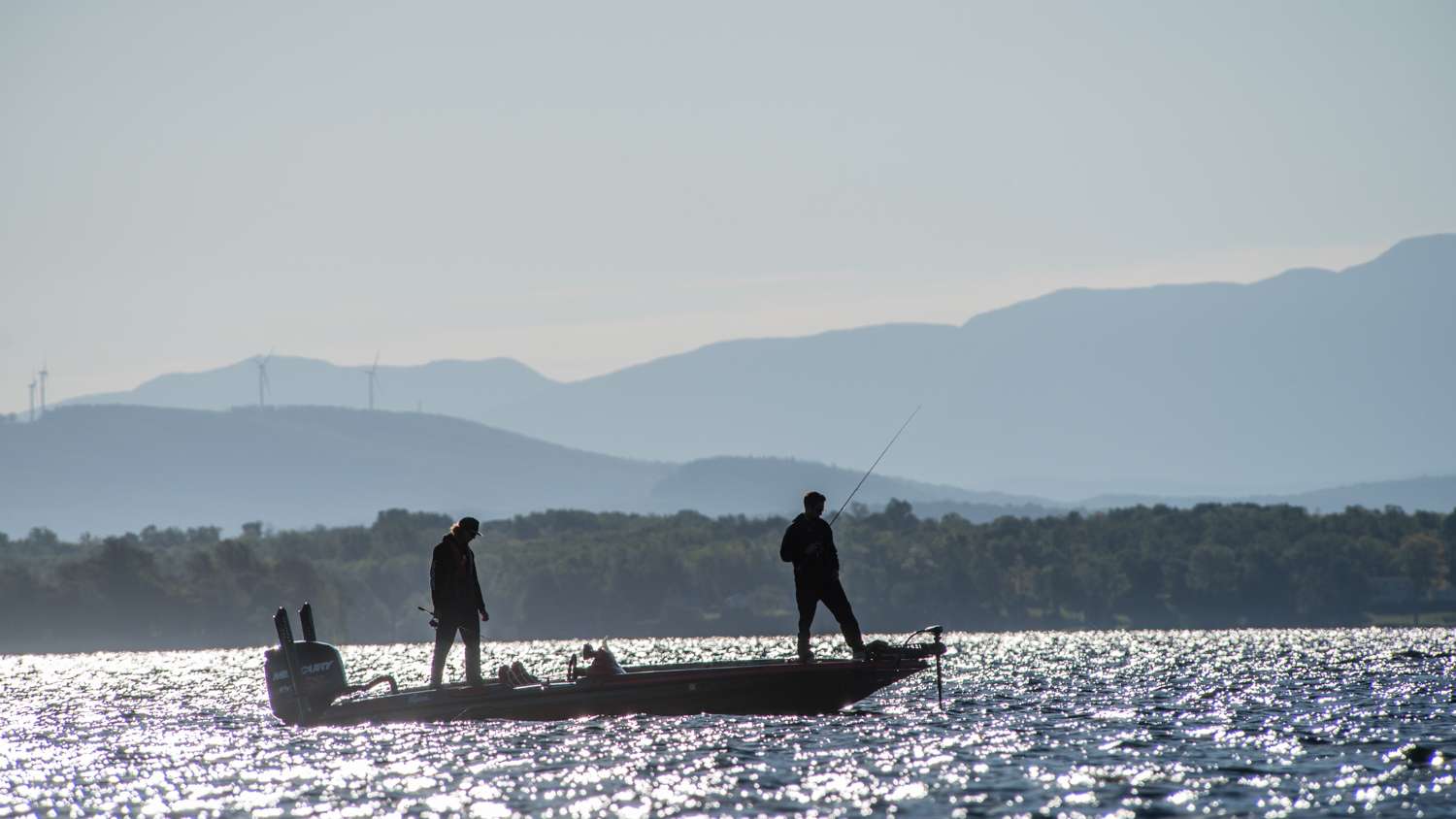 With the Adirondack mountains in the background anglers head to their day one fishing locations in hopes of a big bag. 