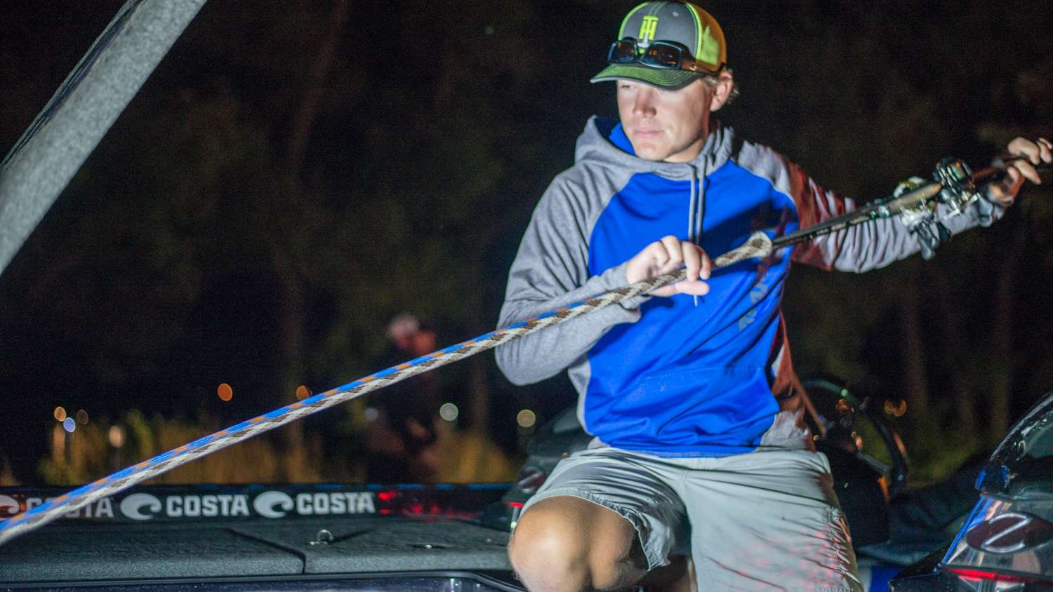 Jody White, originally from Vermont, pulls his rods out and checks his tackle over. 